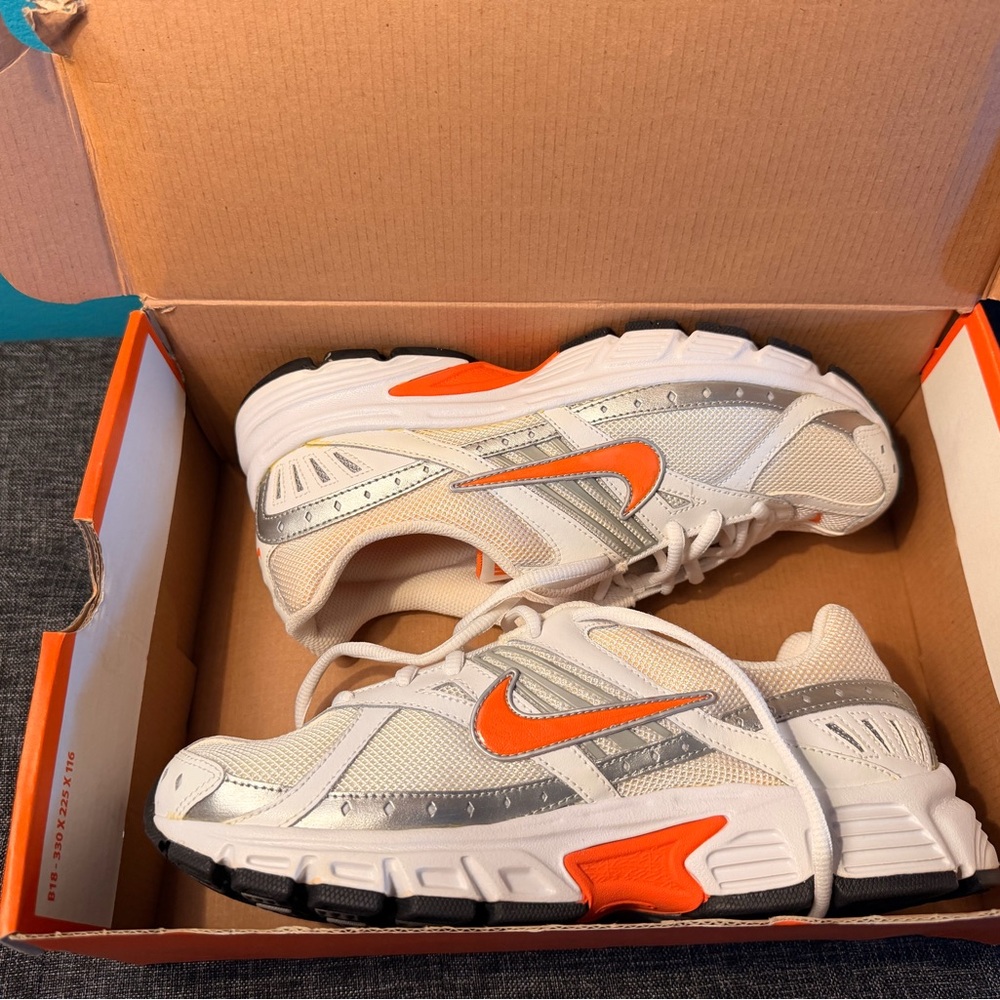 Nike women’s White Sneakers with Bright Orange Swoosh